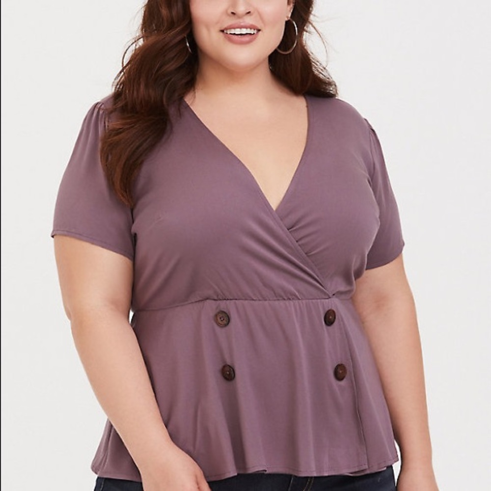 Torrid. purple peplum top size 5